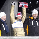 26 February: King Harald and Queen Sonja with world champion Marit Bjørgen after her victory on the 15 km cross country (Photo: Lise Åserud / Scanpix)
